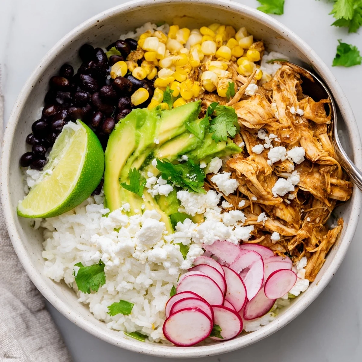 Delicious Green Enchiladas Rice Bowl with zesty chicken, rice, and vibrant veggies.  