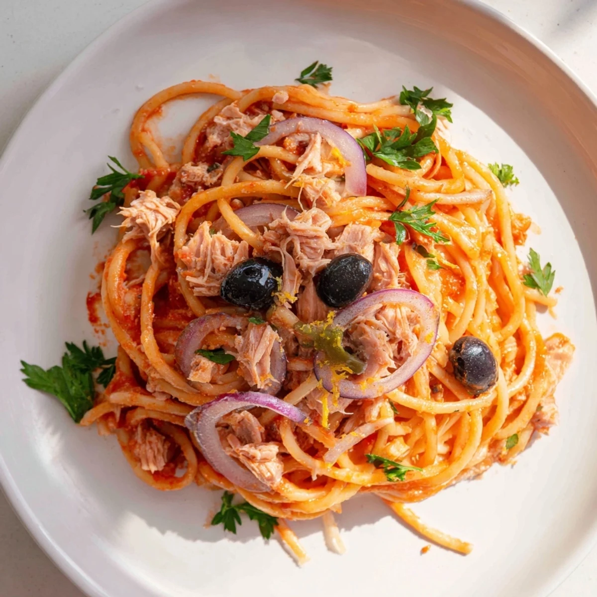 Pasta with Tuna, Olives & Capers: A close-up view of the finished Italian pasta dish, ready to eat.