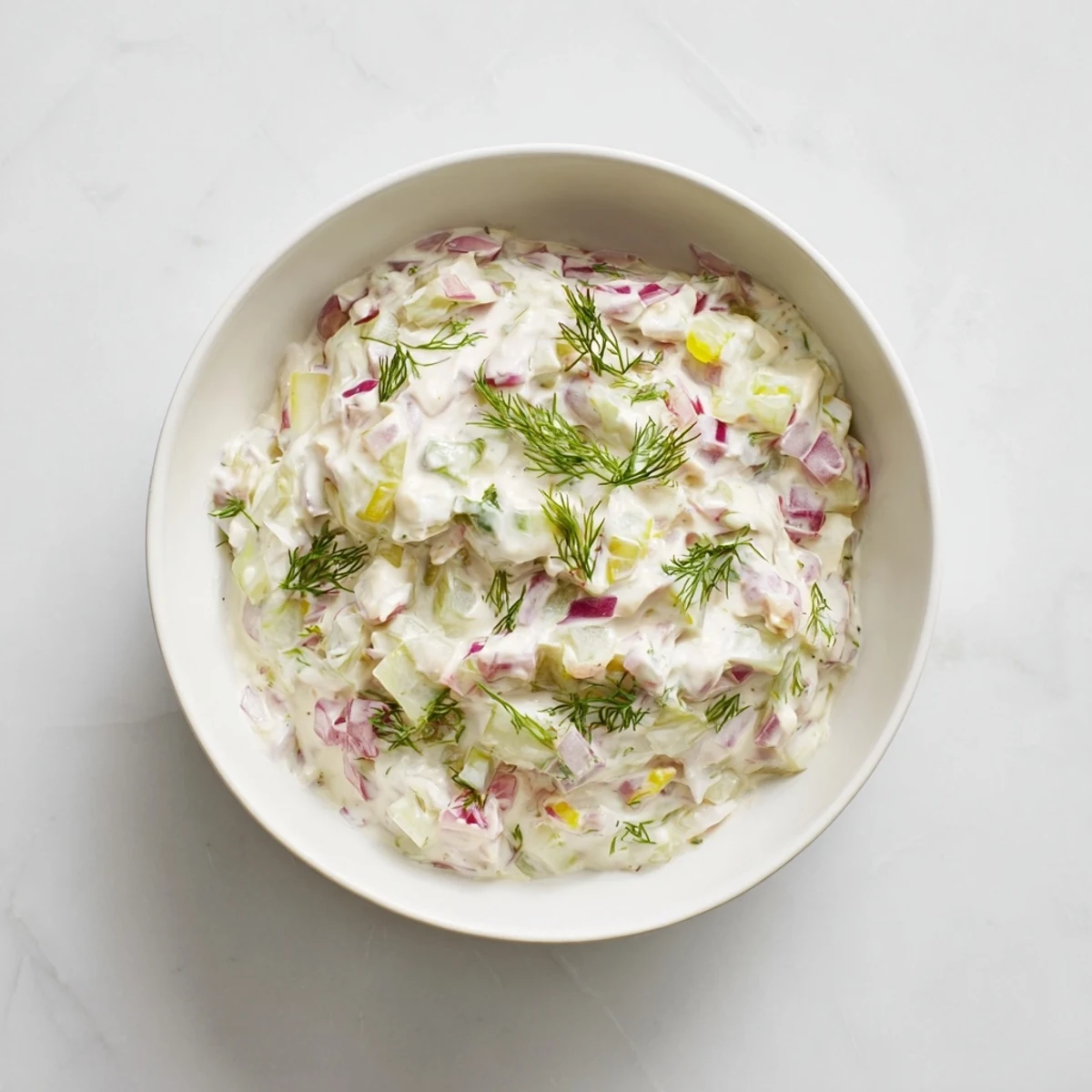 Creamy sweet and sour pickle relish dip with crunchy chips, perfect for your next party appetizer.