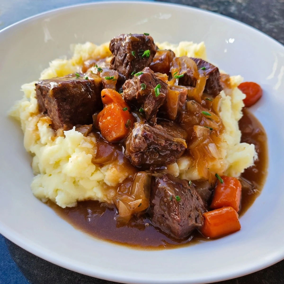 A close-up view shows a hearty Fall Apple Cider Stew Mash, ready for a comforting meal.
