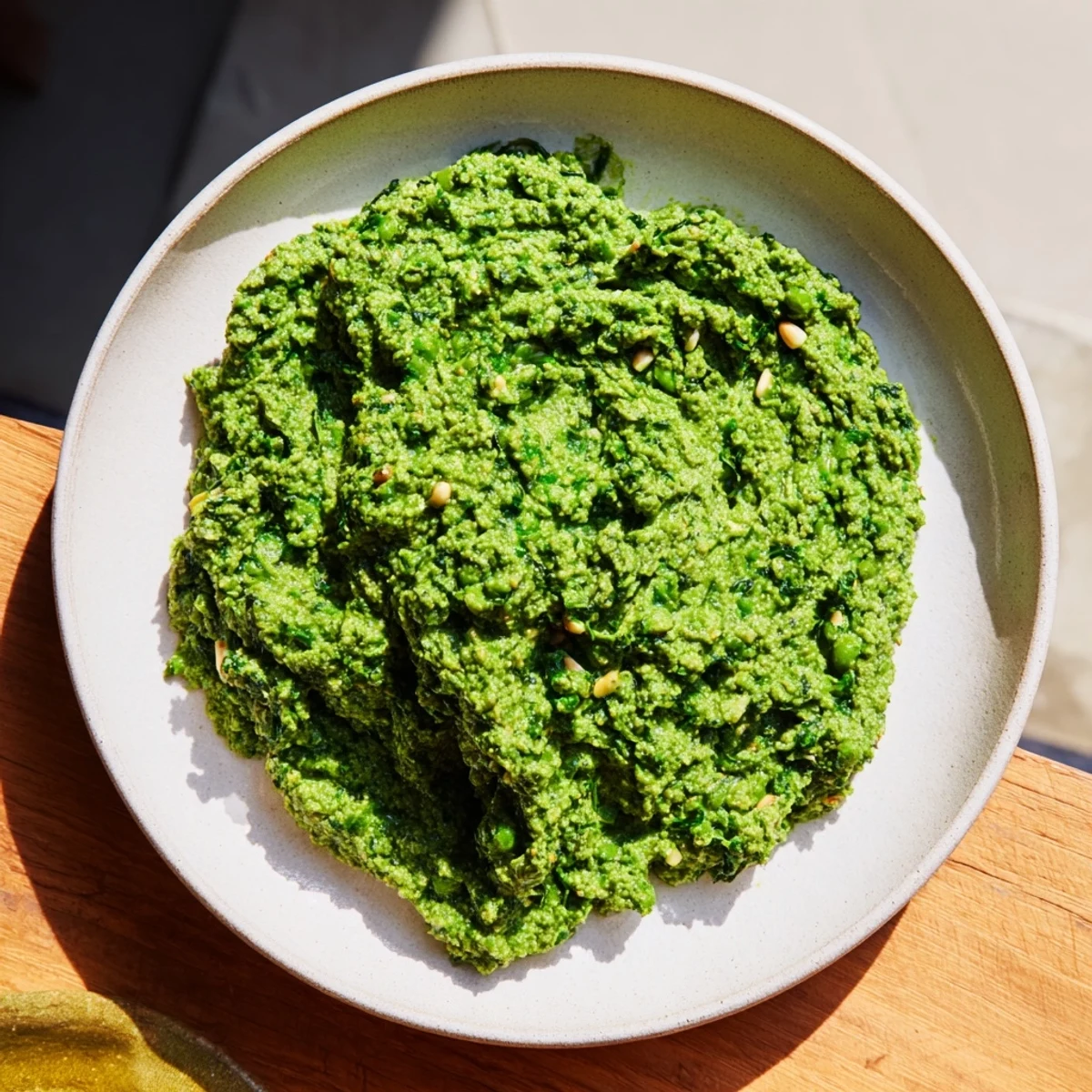Green Pea & Spinach Elf Green Protein Pasta plated, creamy green sauce coats the pasta, ready to enjoy.