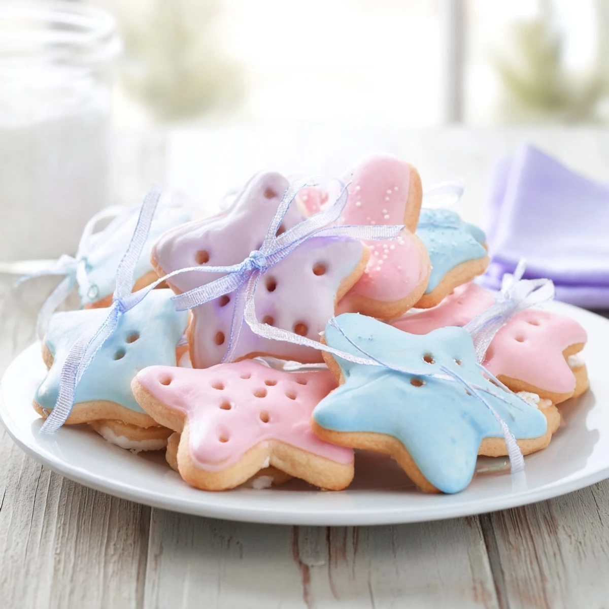 Beautiful Mignonneries Coeurs et Étoiles Rubans in a stack, heart and star shapes, tied with pink ribbons.