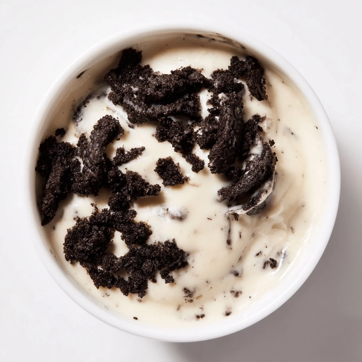 Creamy Vanilla Pudding with crushed Oreos, a layered dessert with a rich vanilla flavor and crunchy cookies.