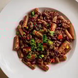 Rich, dark chili with ditalini pasta, spiced with cumin, smoked paprika, and melted dark chocolate.