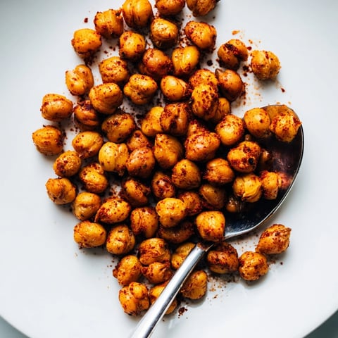 Golden Roasted Chickpea Snack Mix, seasoned with paprika, ready for a healthy bite.