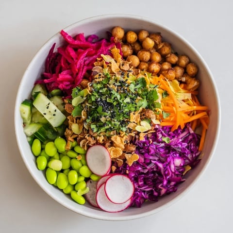 Colorful ASMR Crunch Snack Bowls filled with vibrant veggies and crispy toppings.  