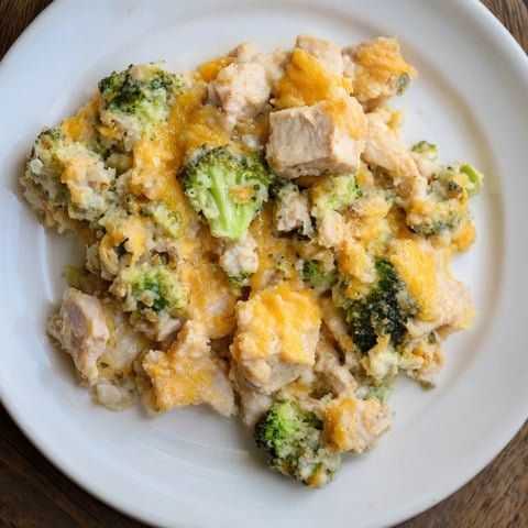 Golden, bubbly Cheddar Broccoli Chicken Bake: a hearty casserole with tender chicken and melted cheese.