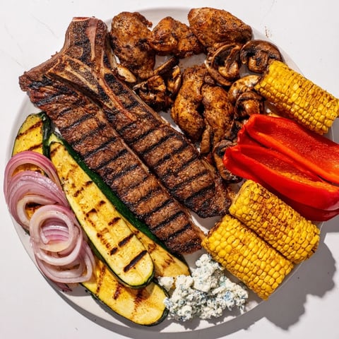 A Backyard BBQ Companion: a platter overflowing with grilled meats and veggies, ideal for a summer feast.