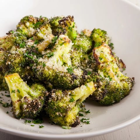 Golden, crispy Garlic Parmesan Roasted Broccoli, ready to serve as a flavorful side dish.