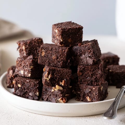 Fudgy zero-waste brownies showcasing leftover nut-milk pulp and toasted walnuts.  