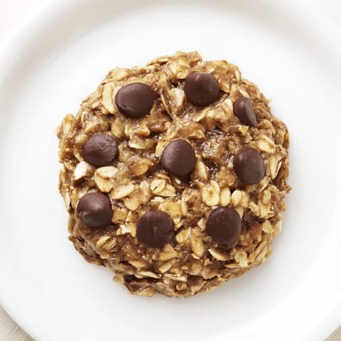 Delicious Oat-Banana Chocolate Chip Cookies, featuring speckled chocolate and soft texture at the edges.