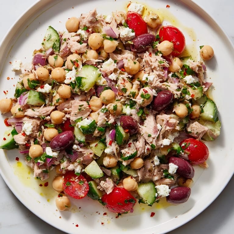 This colorful Tuna Chickpea Salad features flaky tuna and creamy chickpeas, perfect for a quick meal.