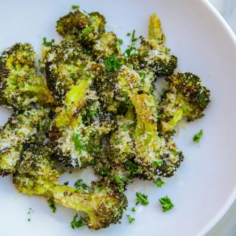Warm, roasted Garlic Parmesan Broccoli, with melted cheese coating each tender floret.